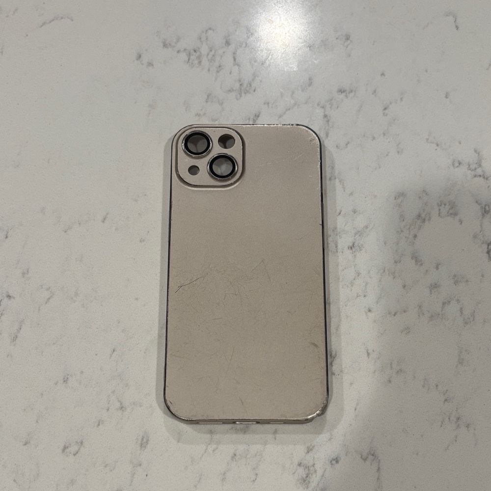 Silver pink iPhone case for iPhone 13.